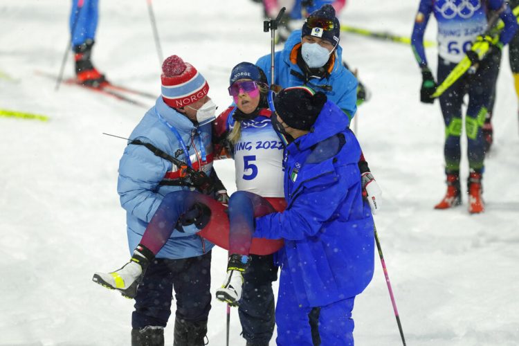 Biathlete who collapsed at end of Olympic race heads home